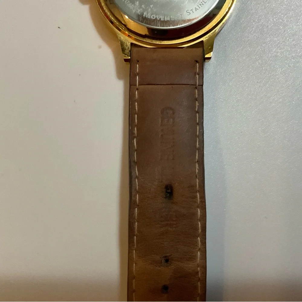 Seiko: men’s but unisex Camrose, Kross Jackie Onassis collection leather watch.